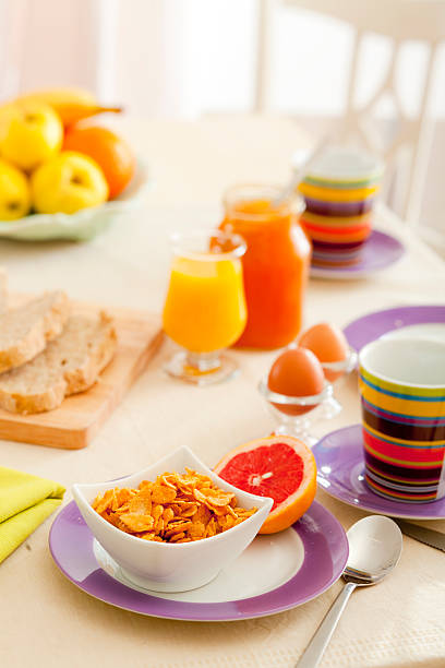 istock Breakfast with juice, fruits, jam and eggs 97035258