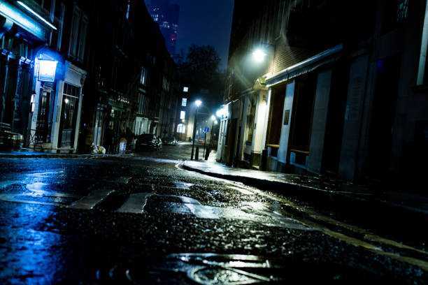 Trafalger Square Bus light trail in Trafalger Square, London dark street stock pictures, royalty-free photos & images