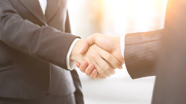 istock Handshake businessmen in the office 970361930