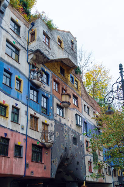 Multicolored facade of the Hundertwasser house, Vienna, Austria Vienna, Austria - October 22, 2017: Multicolored facade of the Hundertwasser house, city attractions and tourist attraction center hundertwasser house stock pictures, royalty-free photos & images