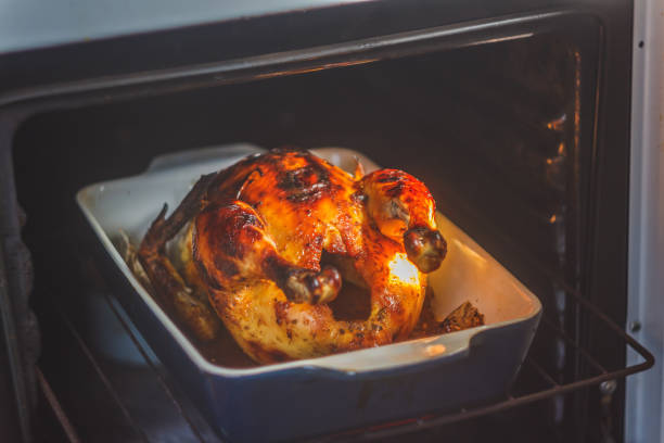 istock appetizing baked chicken with golden roasted crust cooked in the oven 970379752
