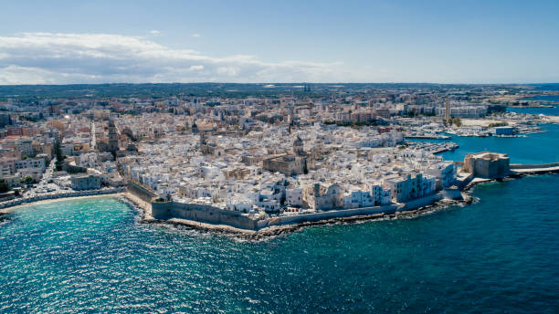 White city near blue the Sea Monopoli Apulia Coastline blue in Italy Drone 360 vr Virtual Sphere Monopoli white City in Italia near the blue sea Drone 360 summer photo trulli house photos stock pictures, royalty-free photos & images