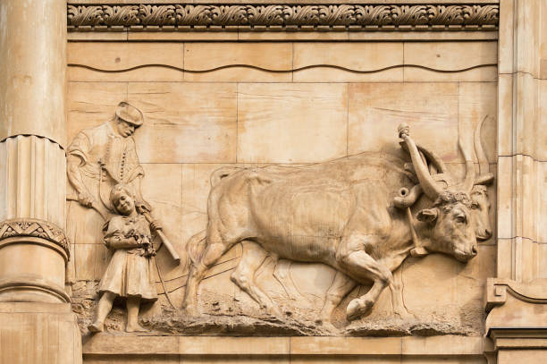 Monumental architecture in Budapest, Hungary: sculpture on a facade front (detail). This is the building of the Hungarion national Bank in the old quarters of Pest.