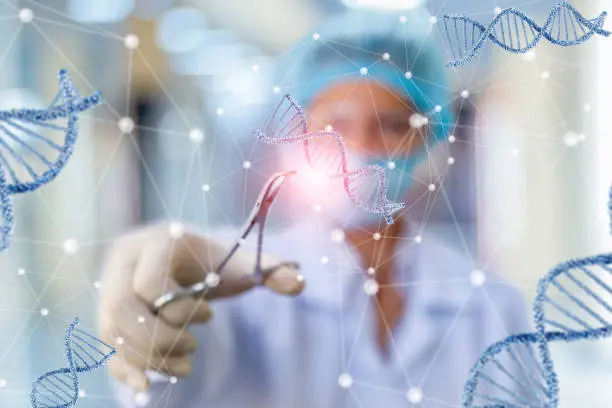 Researcher working with DNA on blurred background.