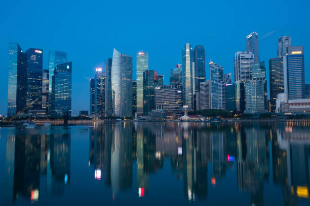 istock Singapore city skyline at dusk 970395106