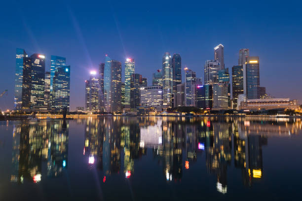 istock Singapore city skyline at dusk 970395166