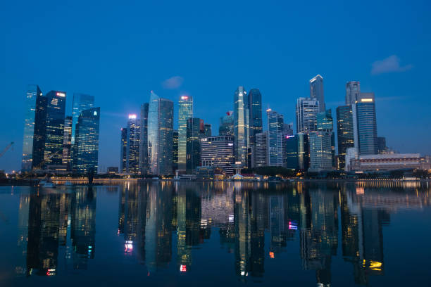 istock Singapore city skyline at dusk 970395196