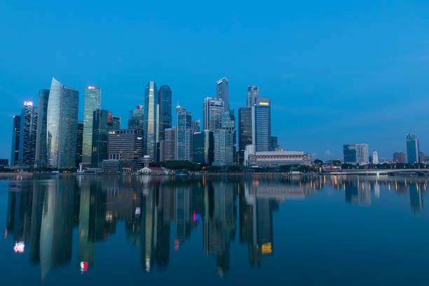 istock Singapore city skyline at dusk 970395416