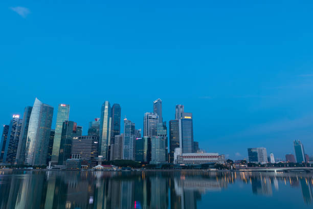 istock Singapore city skyline at dusk 970395418