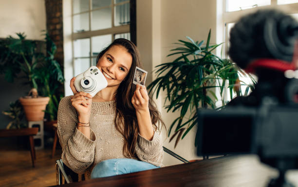 istock Woman blogger recording her content on camera 970398534