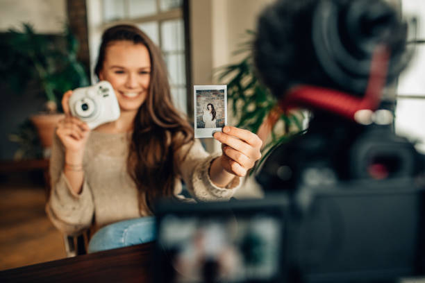 istock Woman blogger recording her content on camera 970398608
