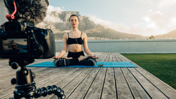 istock Woman blogger recording her content on camera 970398744