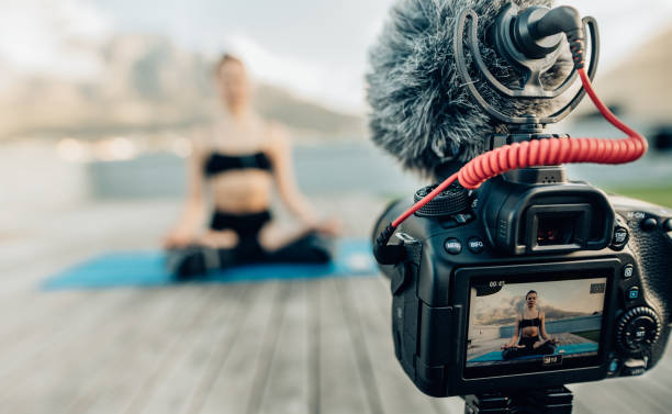 Woman blogger recording her content on camera