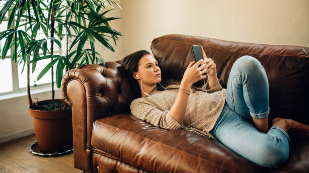 istock Woman relaxing at home 970399164