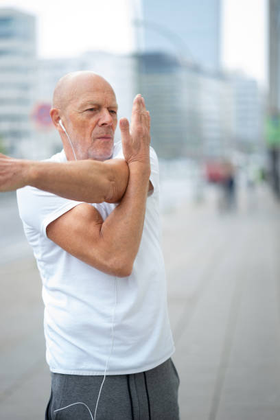 istock Senior man exercising outdoors 970403382