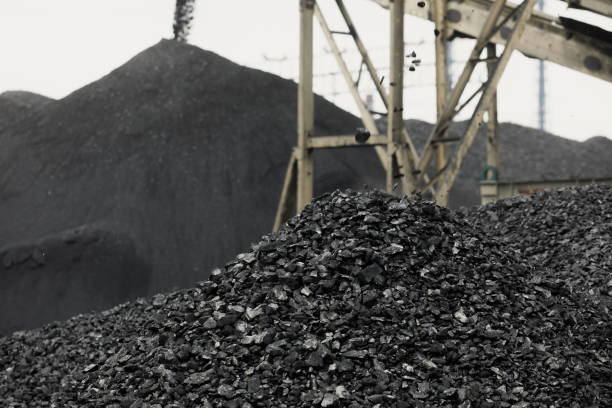 istock Coal stacker and Coal Reclaimer are mining machinery, or mining equipment in the mining industry that large or huge machine used in bulk material handling in stockpile as the Coal Production 970403520
