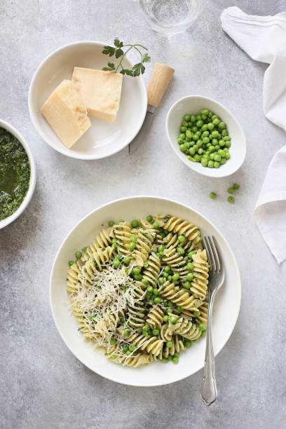 istock Pasta with pesto, green pea and parmesan 970408228