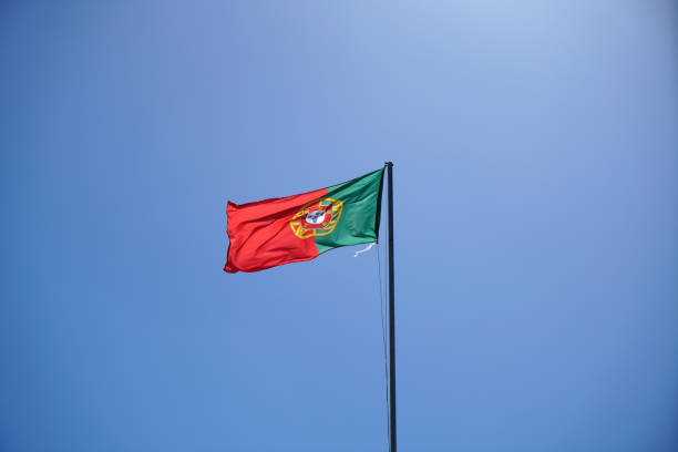 Portuguese and European flag on a building in the Algarve