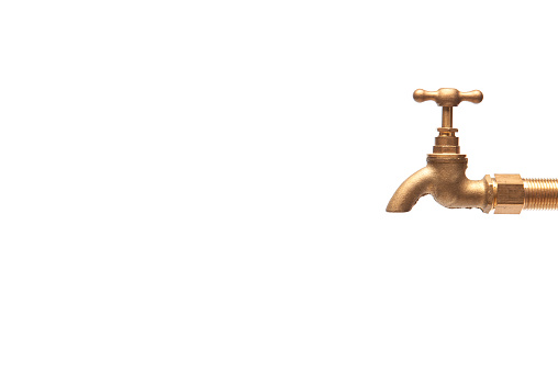 vintage golden brass valve isolated on white background.