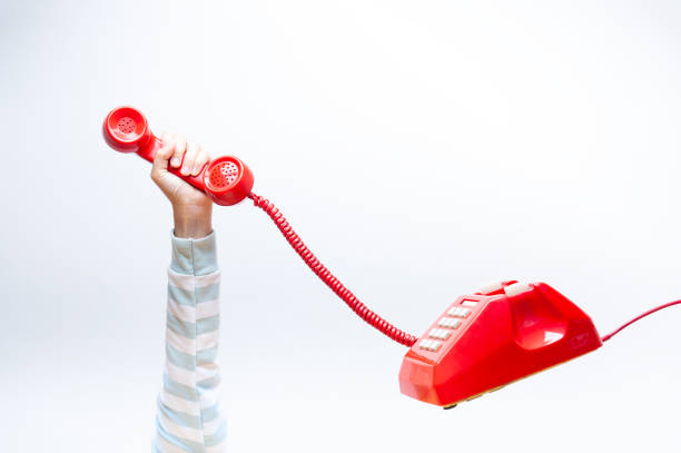 istock Hand holding up telephone 970416064