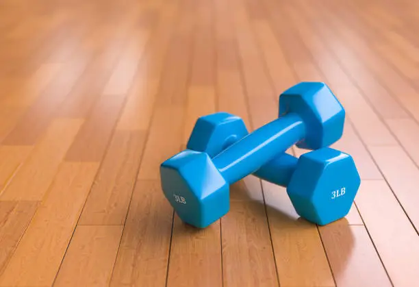 Photo of dumbbells for fitness and sports on the floor - 3LB - 3d illustration - rendering