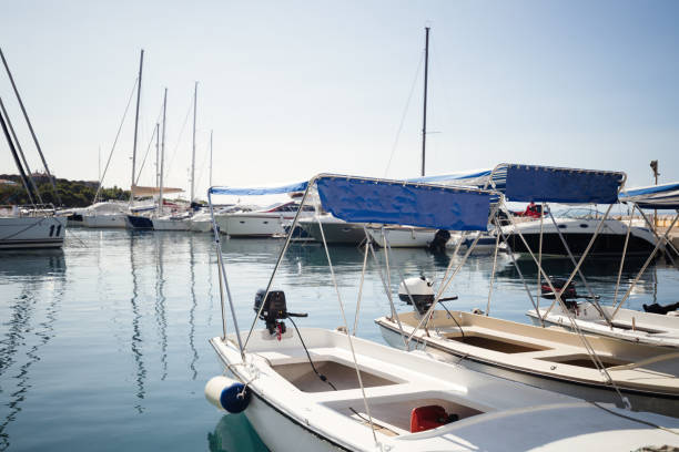 istock Picture of luxury white yachts in harbor 970416794