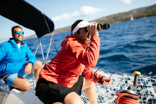 istock Attractive strong woman sailing with her boat 970417450