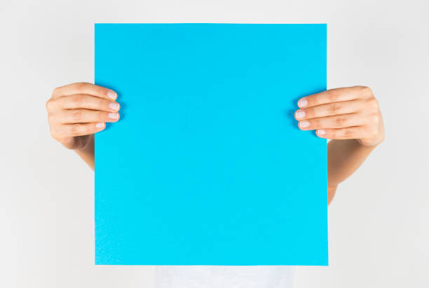 istock Woman with blue sign 970420946