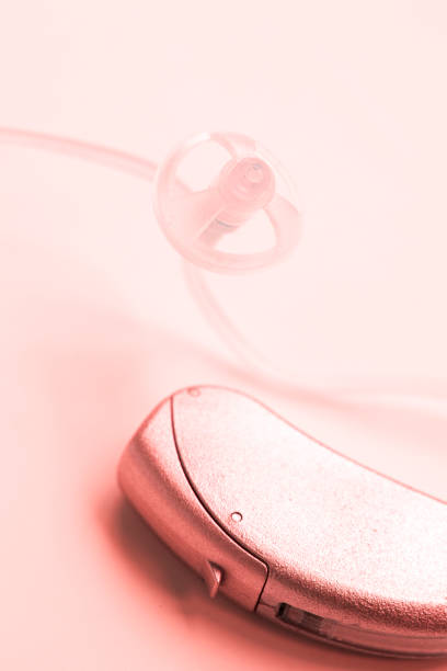 istock Digital modern technology hearing aid device to help the deaf and har of hearing. 970425010
