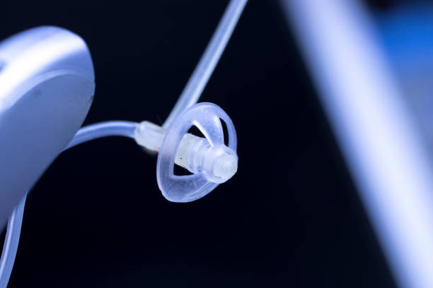 istock Digital modern technology hearing aid device to help the deaf and har of hearing. 970425452