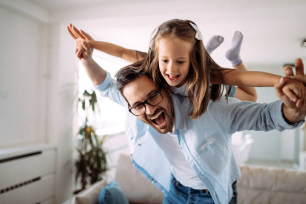 istock Happy family having fun time at home 970432890