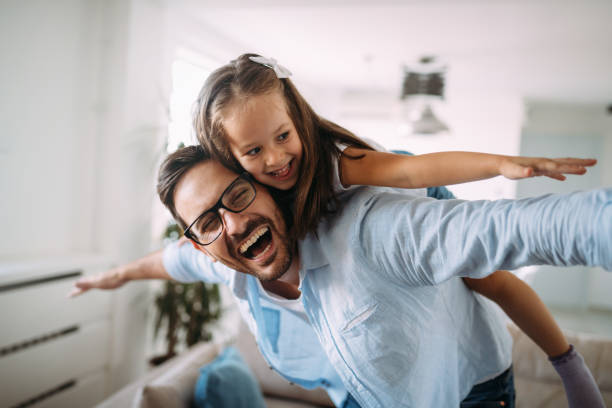 istock Happy family having fun time at home 970433154