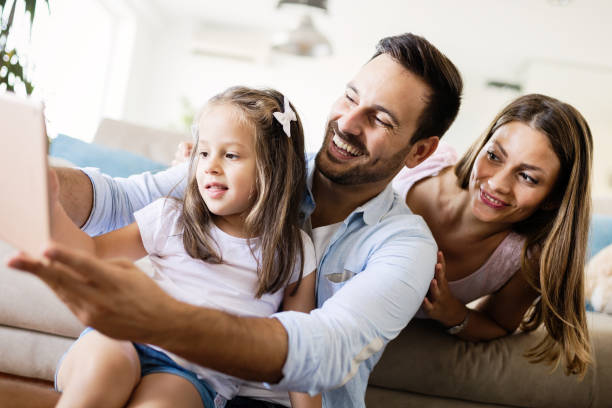 istock Happy family having fun time at home 970436306