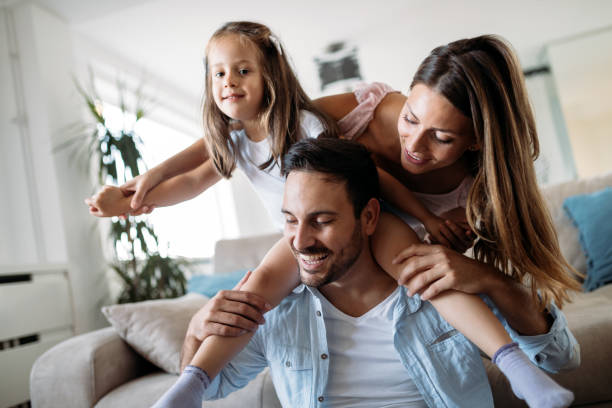 istock Happy family having fun time at home 970436506