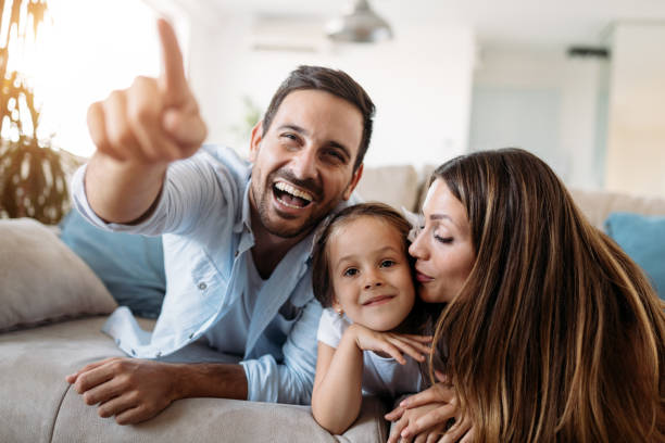 istock Happy family having fun time at home 970436702