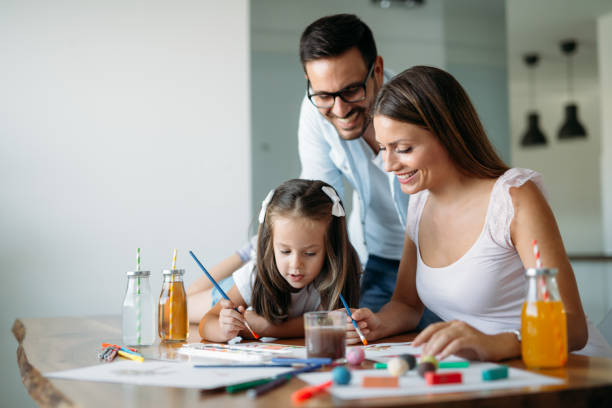 istock Happy family having fun time at home 970437038