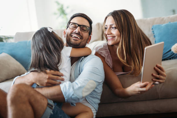 istock Happy family having fun time at home 970437244