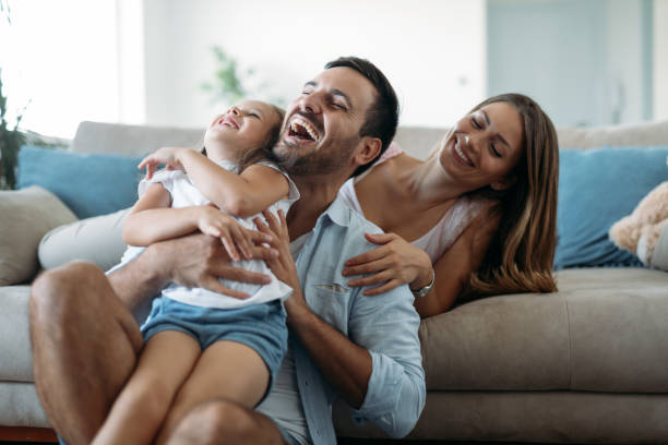 istock Happy family having fun time at home 970437316