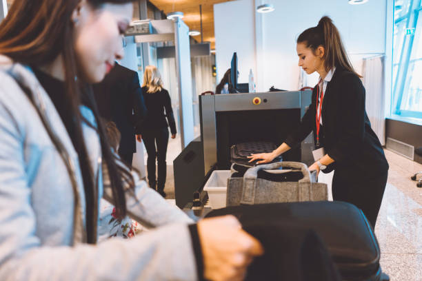 istock Luggage going trough x-ray machine at airport security check 970440600