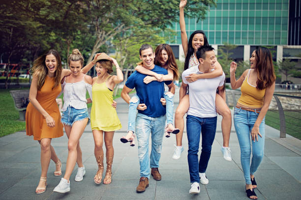 istock Happy friends are hugging and walking together 970445262