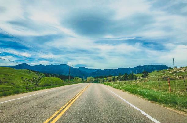 istock road leading to the mountains 970449012