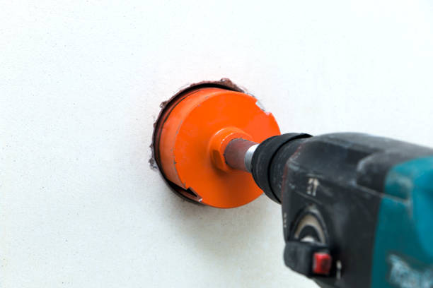 istock rotary hammer drills holes for outlets 970451270