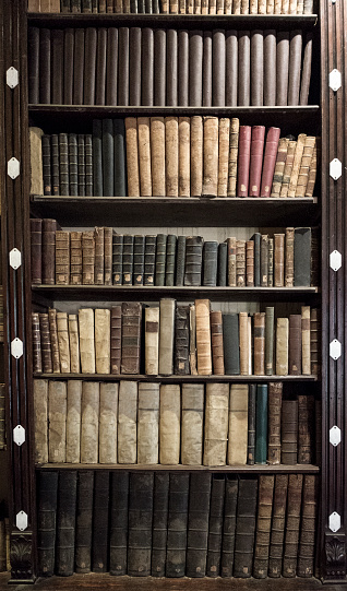 Old Books In A Bookcase