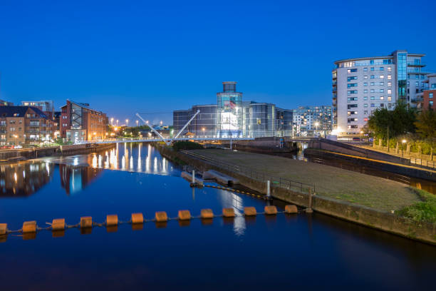 istock River Aire and apartments in Leeds city centre at night 970471184