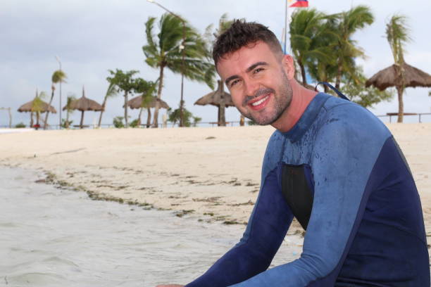 istock Stunning young man rocking a wetsuit 970473724