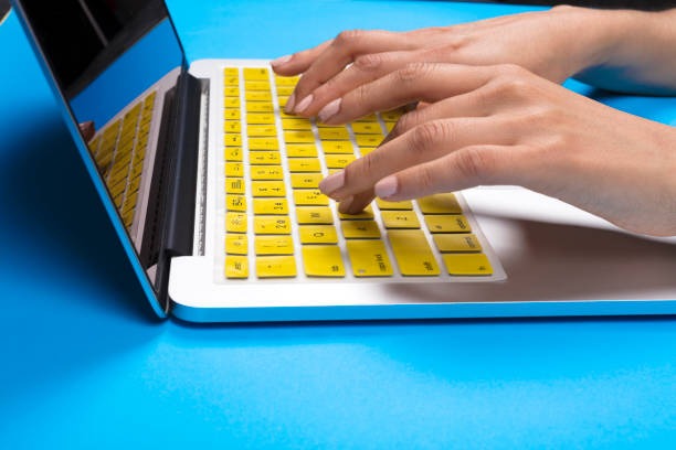 istock Side view of colorful laptop keyboard 970506740