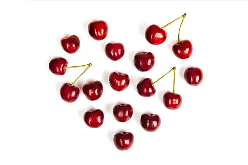 Sweet red cherries isolated on white background