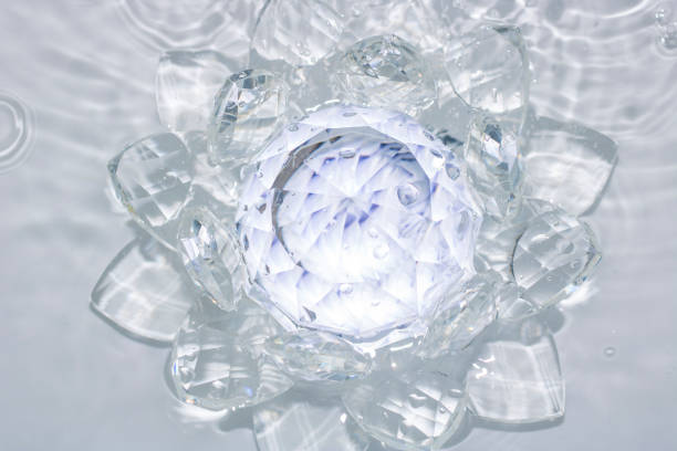istock lotus-shaped crystal over water 970527540
