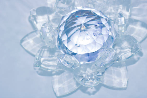 istock lotus-shaped crystal over water 970527544