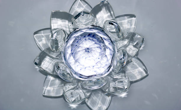 istock lotus-shaped crystal over water 970527548